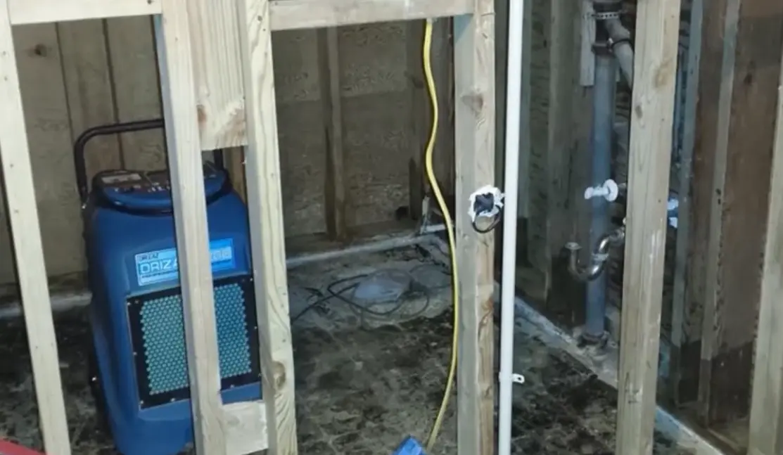 Water damage restoration crew working on an older San Francisco multi-unit building