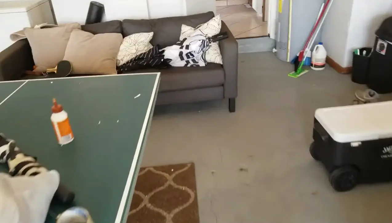 Technician performing a water damage inspection in a San Diego home